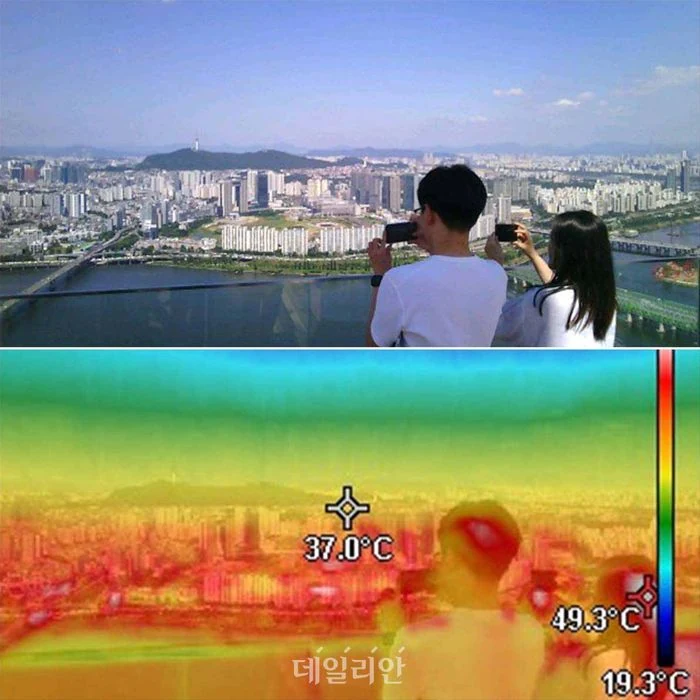 6일 오후 서울 여의도 63빌딩 전망대에서 열화상 카메라로 촬영한 서울 도심, 온도에 따라 색이 다르게 표시됨
